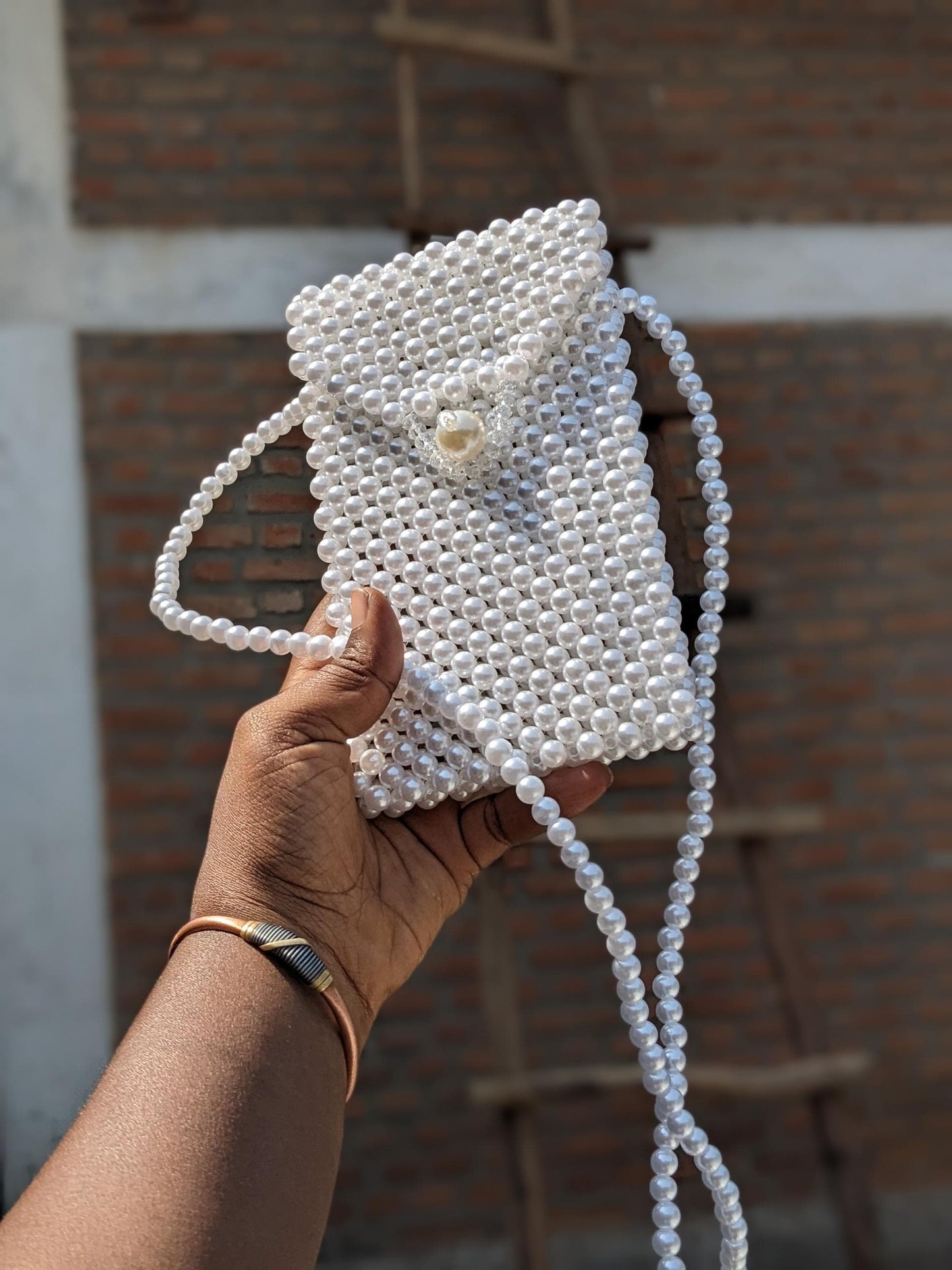 Pochette en perle avec cordon